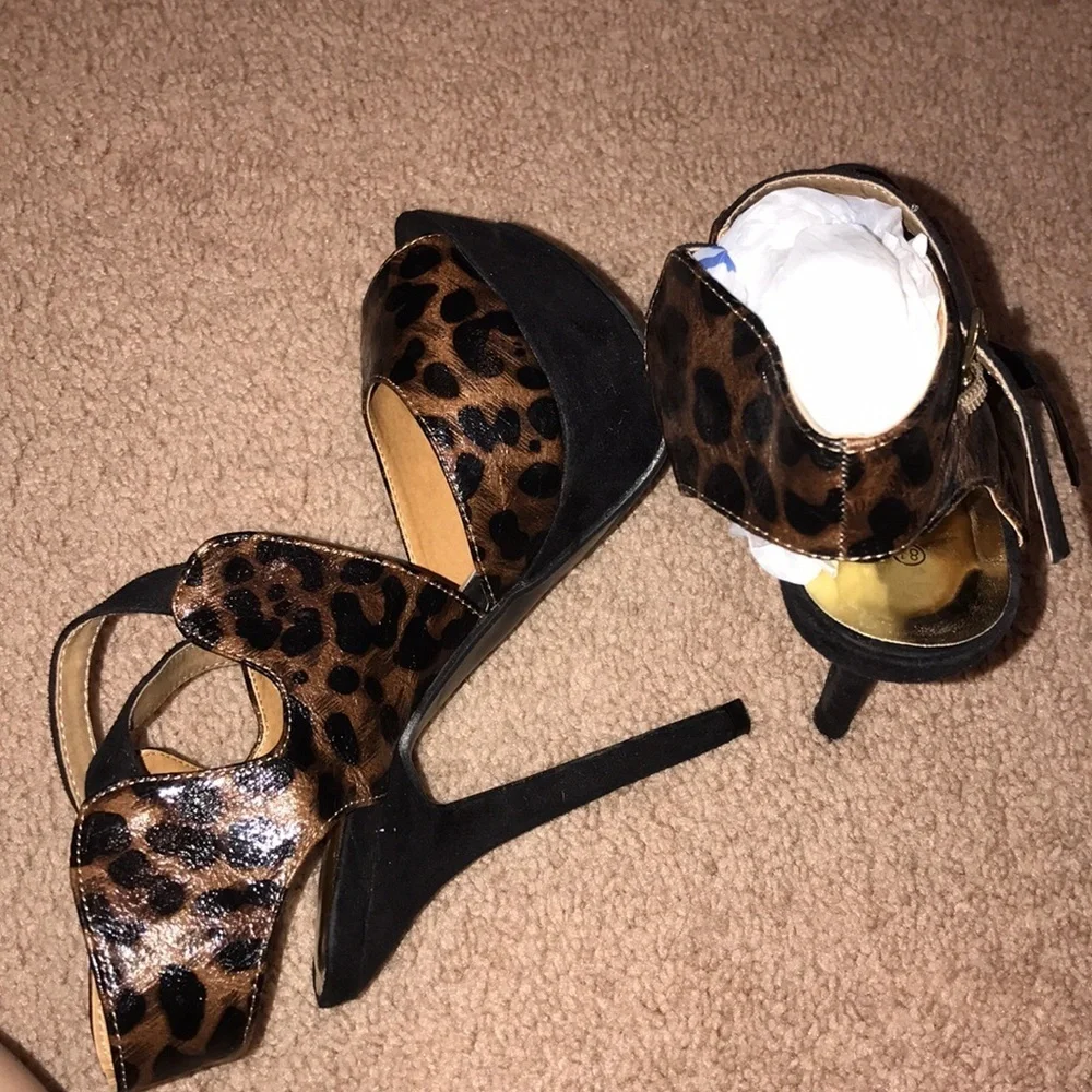 Platform cheetah peep-toe heels